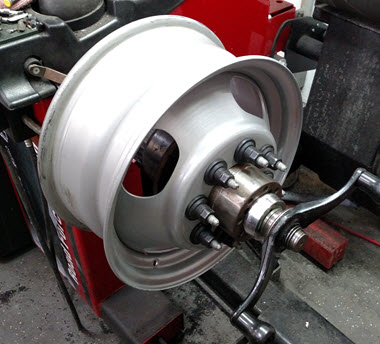 Road force mounted with hub and 8 lug nuts