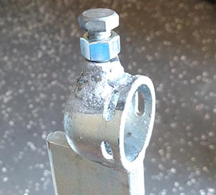 Adjustment bolt and nut installed on receiver end