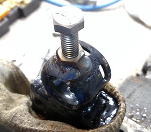 Adjustment bolt and nut installed on tongue end